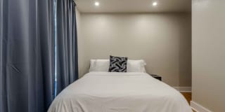 Completely remodeled like new Gingerbread midtown cottage with gleaming hardwoods, converted from a 3/1 to a 3/2. Gallery 30