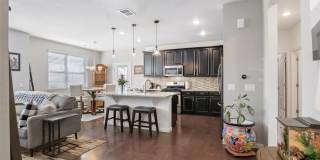 Like new gorgeous ground level Condo with Detached Garage and open floor plan. Gallery 5