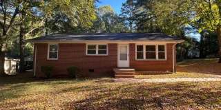 3bed 1.5 bath Brick Ranch- Freshly painted- Hardwood Floors- Carport- Storage Shed!!! Gallery 1