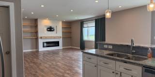 Spacious 4-Bedroom Twin Home | 3-Stall Garage + Fenced Yard Gallery 1