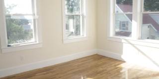 Nicely renovated Townhouse in a prime location near the Green Line with parking included! Gallery 19