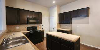 Wood Like Tile Flooring & Vinyl Plank - No Carpet / 1 Story Unit/ Fenced in Yard / Interior Washer Dryer Connections / CISD Gallery 12