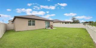 Gorgeous 3/2 in St. Cloud with fence enclosed yard and 3 car garage!  Available Now! Gallery 25