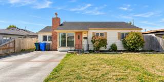 Charming 2-Bedroom Home with Spacious Sunroom, Large Backyard & Detached 2-Car Garage! Gallery 1