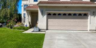Spacious 5-Bedroom Home with Solar, Stunning Sunroom & Upgraded Bathrooms! Gallery 1