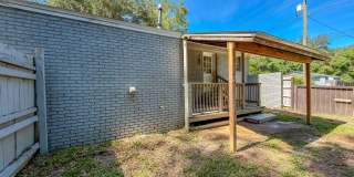 RENOVATED 2/1 w/ New Flooring/Paint, Fenced Yard, Deck, Walk In Closets, Granite Counters, & Stainless Appliances ! Avail NOW for $1295/month Gallery 33