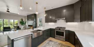 Discover modern elegance in the newly constructed Edgewater Condominiums, a boutique community featuring 18 luxurious units with 9 still available for purchase. Gallery 13