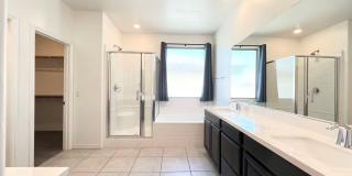 Beautiful 4-Bedroom Home with Dual Primary Suites in Henderson! Gallery 19
