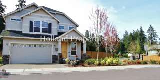 Spacious 4-Bedroom Hillsboro Home with New HVAC, Gas Fireplace & Prime Location Gallery 1