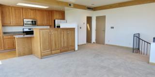 2 Story Condo with Parking, Views and Outdoor Space! Gallery 1