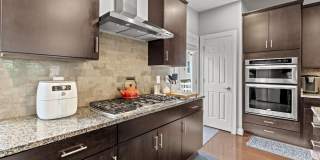 Welcome to 9618 Stockwell Lane—an exceptional 3-level, 4-bedroom, 3.5-bath townhome in the heart of Fairfax that has been thoughtfully updated to offer both style and functionality. Gallery 13