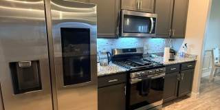 Like-New 4BR Home with EV Charging & Designer Upgrades Gallery 3