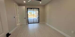 Brand-New Waterfront Luxury in Cape Coral | Heated Pool, Spa, Outdoor Kitchen & 3-Car Garage Gallery 15