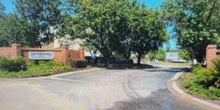 2 Bedroom 2 bath apt with a POOL! Very close to everything but tucked away. Gallery 1