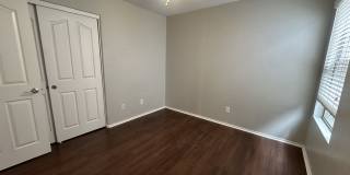 Single-level 3-bedroom home in a desirable Chandler location featuring a 2-car garage and tile roof and wood plank flooring throughout Gallery 33