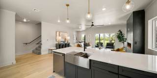 Discover modern elegance in the newly constructed Edgewater Condominiums, a boutique community featuring 18 luxurious units with 9 still available for purchase. Gallery 14