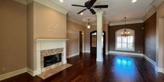 4 Bedroom, 3 Bathroom, Brick Home, Two Car Garage, Fireplace, High Ceilings, Granite Countertops, Fenced in Yard. Custom Built Home, Walkers Lake Subdivision , Triple-Split Floor Plan. Gallery 5