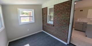 Updated Open-Concept with Sunroom & Finished Basement Space Gallery 10