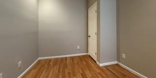 Charming 4BR/2BA Rowhouse with Hardwood-Style Flooring Throughout Gallery 6