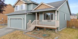 Bright & Spacious 4 Bedroom Home in Yelm for Rent | Vaulted Ceilings, Fenced Yard, Granite Kitchen, A/C Gallery 1