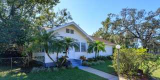 Run don't walk for this one of a kind beautifully maintained Old Florida Charmer on a park like double lot! Gallery 1