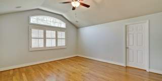 Stunning two-story spacious home on tranquil tree-lined street. Gallery 48