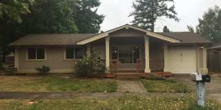 Spacious 4-Bedroom Home with Large Fenced Yard  Covered Patio Gallery 1