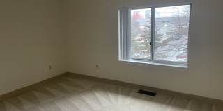 2-bed & 1.5 bath Townhouse with AC & Parking in Boston Landing  Family + Pet Friendly Gallery 14