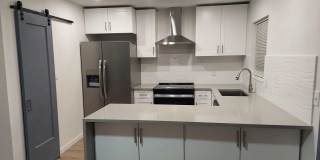 5657 S Lowell Blvd Gallery 1