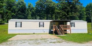 Welcome home! Great location!  3 bed, 2 bath, large kitchen, parking for 2, lots of green space, W/D hookups, must see! Gallery 1