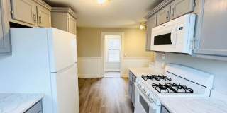 NEWLY RENOVATED 4-BED PENTHOUSE UNIT WITH EASY ACCESS TO HIGHWAY AND PUBLIC TRANSPORTATION! Gallery 1