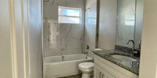 Nearly New Luxury 3-Bedroom Home with Designer Upgrades in Poinciana! Gallery 21