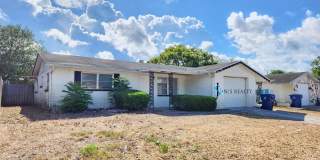 Beautiful 2/2/1 1150 Sq. Ft. with BONUS ROOM!!... tile & luxury plank flooring, Frest paint and a large fenced in yard! Gallery 1