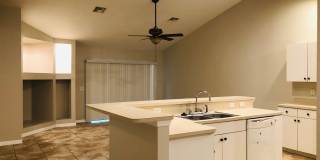 Experience this Cape Coral 3 bedroom 2 bath duplex with 1 car garage and screened in lanai. Gallery 9