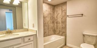 Annual Unfurnished Rental – Coach Home 3 Bedrooms, 2 Baths, 2 Car Garage, with Resort Like Amenities – Gran Paradiso Community! Gallery 1