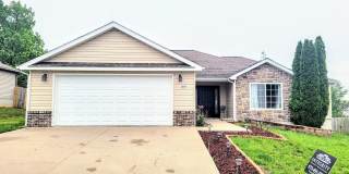 1 story home with a fence Gallery 1