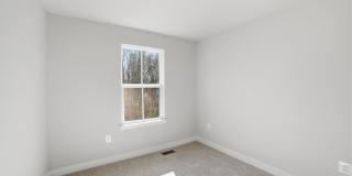 This home presents a harmonious blend of elegance, flexibility, and modern convenience within a welcoming community setting. Gallery 24