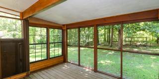Two Bedroom, 2 Bath, 1-Car Garage, 1179 sq ft feet home with wood burning fireplace. and screened porch. Gallery 15