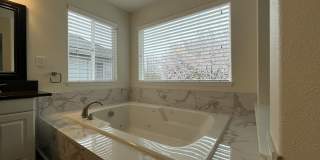 Grand 5 Bedroom Home Featuring 19ft Ceilings, Family Room & Main-Level Suite Gallery 47