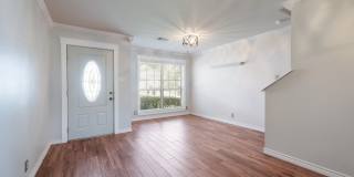 Modern Elegance: 3-Bedroom Townhome with Wood Flooring, Shaded Deck, and Inclusive Amenities Gallery 5