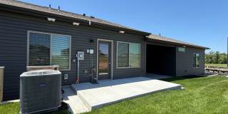 Ranch townhome with 2 stall garage. Spacious 2 bedrooms with walk in closets, 2.5 bathroom, 1st floor laundry Gallery 4