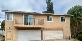 Newly remodeled 2 Bed/1 Bath condo with garage for rent in Paradise Hills. Gallery 1