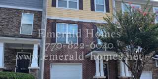 Spacious 3-Bedroom Townhome with Finished Studio Suite – Prime Location! Gallery 1
