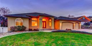 Gorgeous 4 bed, 3 full baths Craftsman Style rambler! Located on a private street with a 3 car garage! Gallery 1