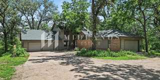 Wooded Papillion 2-Story Gallery 1