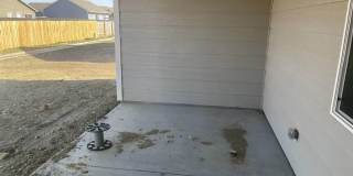 Single family slab home with three car garage. This home is 4 bedrooms, three bathrooms open floor plan. Zero entry home. Mowing included. Gallery 14