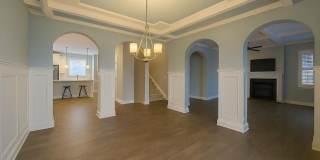 Get ready to fall in love—this sleek, modern beauty in West Creek Farms is bringing the wow factor to Clarksville! Gallery 13