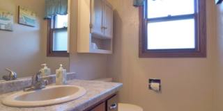 3 Bed, 1.5 Bath Duplex with 2-Stall Garage & Fenced Yard – Green Bay Gallery 1