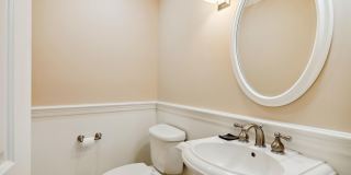 5 BR 4.5 BA home with inground heated pool and extensive hardscape! Gallery 28