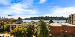 Eastlake Townhome with Rooftop Deck, Views & Dedicated Parking, 2 Bed + Office, 2 Bath Gallery 13